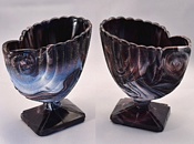 Purple malachite glass, pair of Nautilus Shell vases