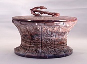 Purple malachite glass, probably a tobacco jar, in the form of a capstan with an anchor handle on the lid