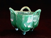 Sowerby glass green malachite, three section, three handled, three footed posy vase
