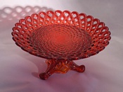Sowerby ruby red, glass ribbon plate and stand