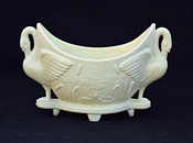 Sowerby glass ivory Queensware, swan flower-holder with lilies and bullrushes