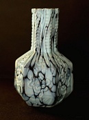 Sowerby glass oriental black bud vase with flower decoration with pale blue marbling